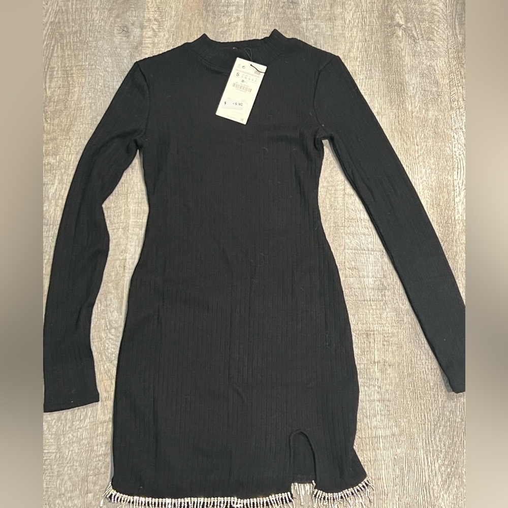 NWT Zara Woman’s black sweater dress with rhinestone detail on bottom.